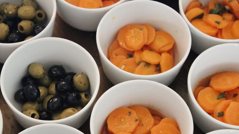 Bowls of sliced carrot salad