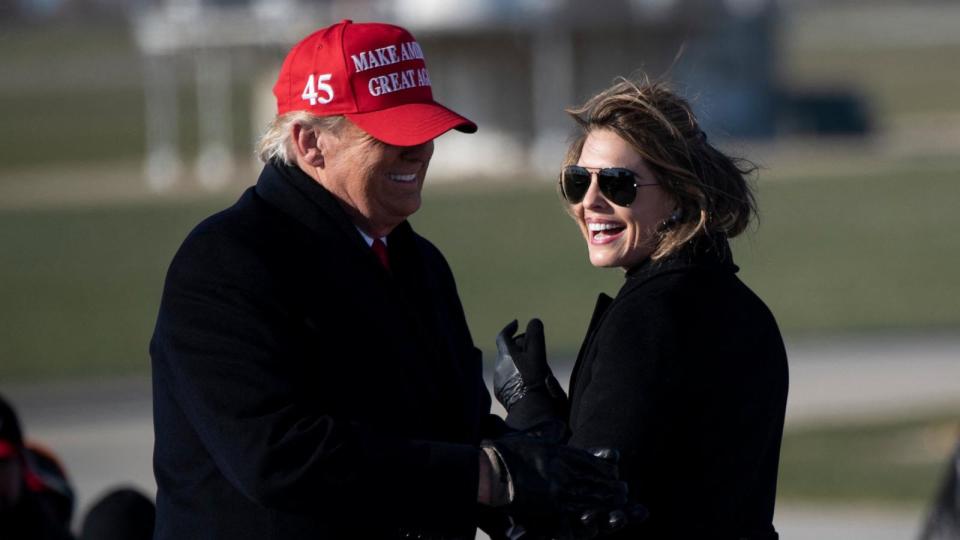 PHOTO: Hope Hicks smiles at President Donald Trump during a Make America Great Again rally, Nov. 1, 2020, in Dubuque, Iowa. (Brendan Smialowski/AFP via Getty Images)