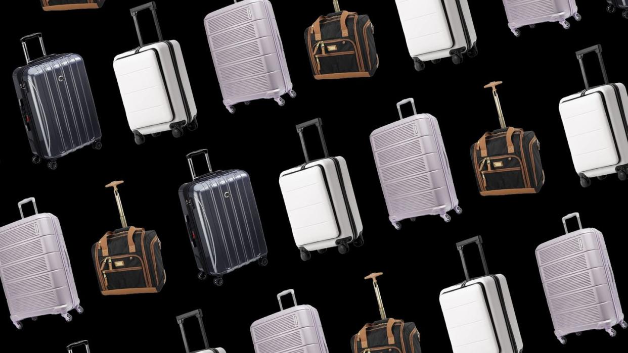 a large group of luggage bags are lined up on the floor