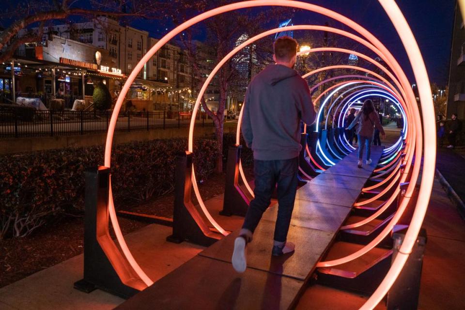 In 2020, the interactive light display in South End Charlotte known as Passage was a popular stop on the Rail Trail. People went through multiple times to activate the lights and sounds.