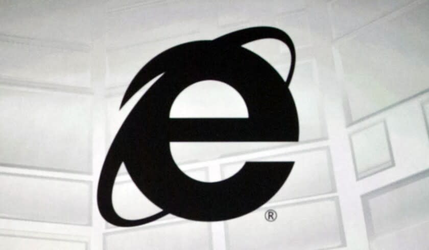 FILE - The Microsoft Internet Explorer logo is projected on a screen during a Microsoft Xbox E3 media briefing in Los Angeles, June 4, 2012. As of Wednesday, June 15, 2022, Microsoft will no longer support the once-dominant browser that legions of web surfers loved to hate and a few still claim to adore. (AP Photo/Damian Dovarganes, File)