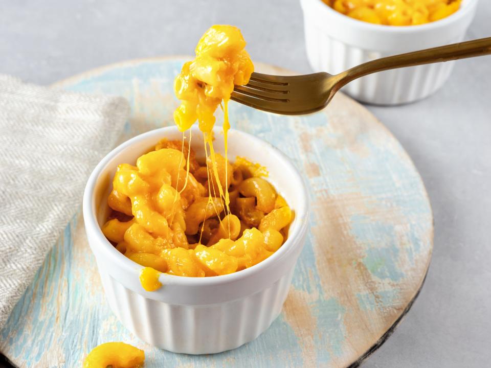 mac and cheese in white bowls