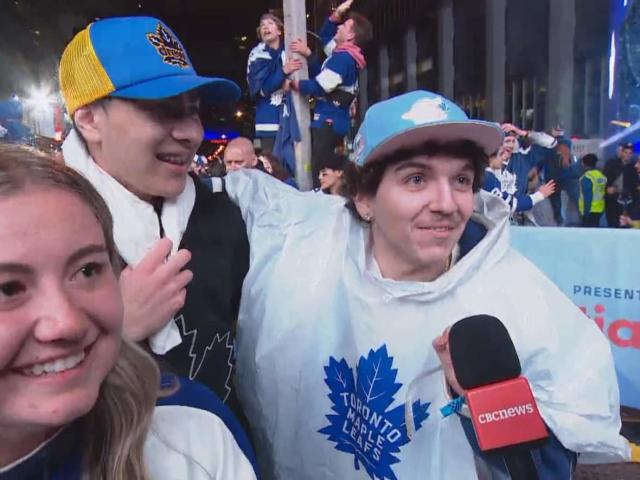 From left to right, Toronto Maple Leafs fans Aleksandra&nbsp;Patalita, Amin&nbsp;Elsherif and Joseph Pentresca. The fans were reacting to the Leafs winning their first playoff round in 19 years. (Darek Zdzienicki/CBC - image credit)