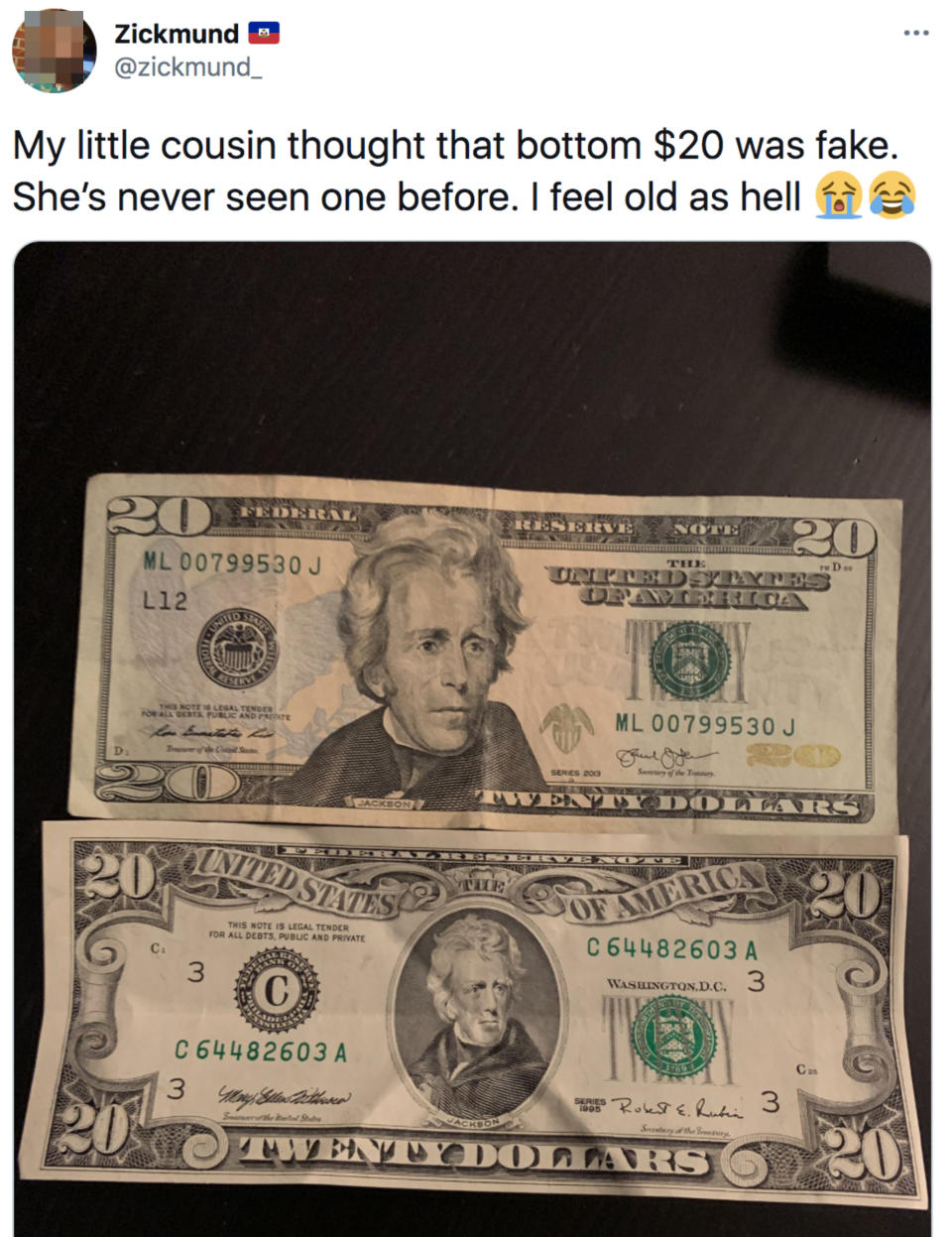 Two $20 bills placed on a surface, one older and one newer. Tweet text expresses feeling old due to cousin's unfamiliarity with the older bill