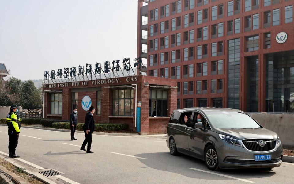 WHO team visit Wuhan Institute of Virology in February, a lab which has been at the centre of swirling theories on the origins of the pandemic - REUTERS/Thomas Peter