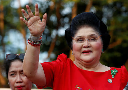 Philippines Former First Lady and Congresswoman Imelda Marcos waves to supporters as she takes part in the announcement of her son BongBong Marcos' vice-presidential candidacy, in Manila Philippines October 10, 2015. REUTERS/Erik De Castro