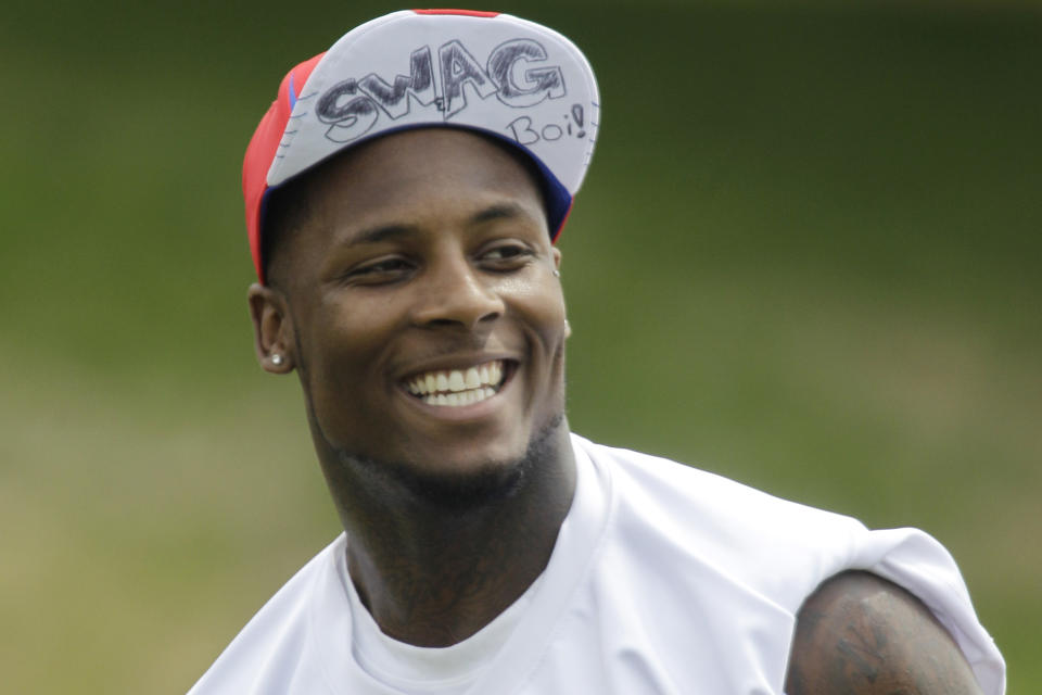 FILE - In this July 31, 2011, file photo, Buffalo Bills' Stevie Johnson smiles during an NFL football training camp in Pittsford, N.Y. The Mafia is becoming legitimate in Buffalo — the Bills Mafia that is. The Bills last week filed an application to trademark its fanbase’s adopted nickname in preparation to launch a series of branded merchandise and apparel available at its team store and sold online. The nickname stemmed from former Bills receiver Stevie Johnson questioning God on Twitter for having a sure touchdown pass fall through his hands in overtime of a 19-16 loss to Pittsburgh on Nov. 28, 2010. (AP Photo/David Duprey, File)