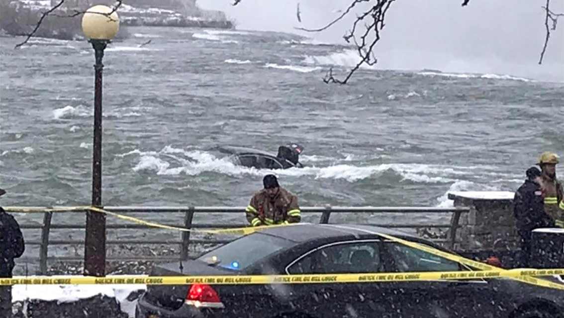 State Parks Police say witnesses reported seeing the car floating down the Niagara River shortly before noon Wednesday before it became hung up on rocks just some 50 yards shy of the brink of the Falls. (WGRZ)