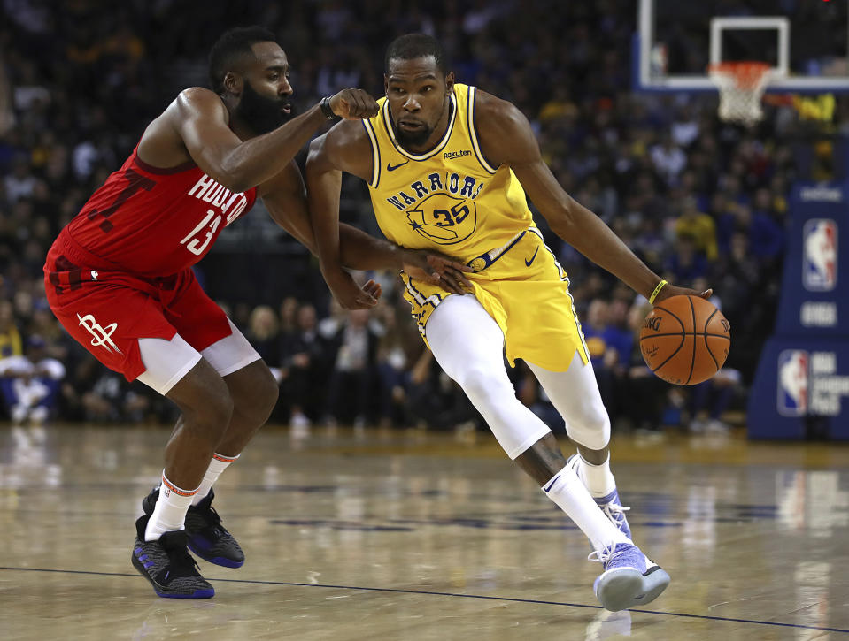 Kevin Durant knew he was out of bounds on Thursday night when diving to save the ball against the Rockets, and said he wasn’t surprised the officials let him get away with it. (AP)