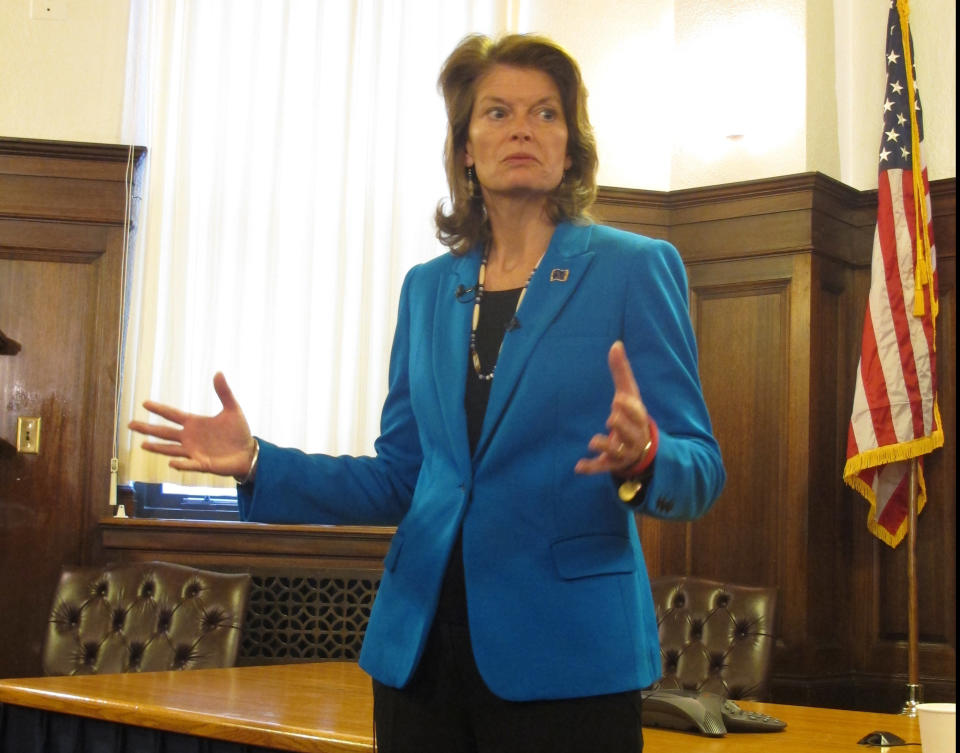 U.S. Sen. Lisa Murkowski talks to reporters on Thursday, Feb. 21, 2013, in Juneau, Alaska. (AP Photo/Becky Bohrer)