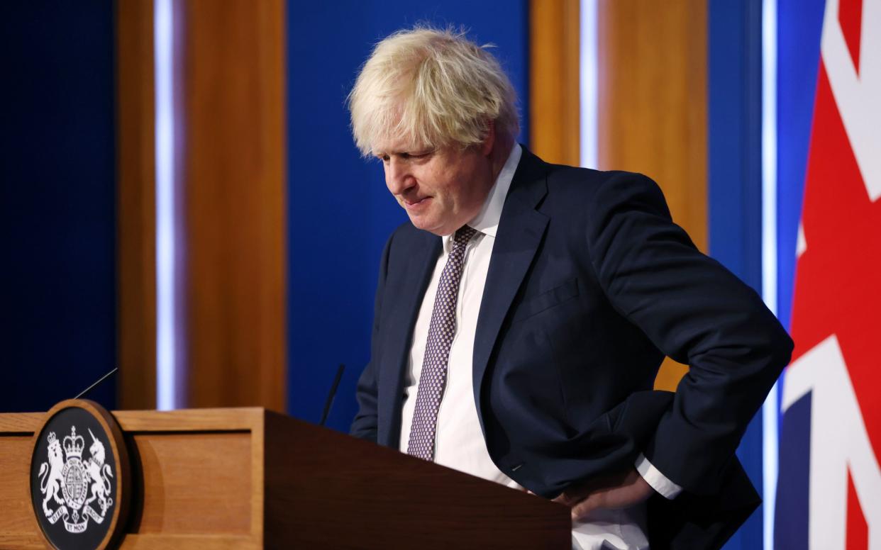 Prime Minister Boris Johnson during a press conference after cases of the new omicron variant were confirmed in the UK - Hollie Adams/Getty Images Europe