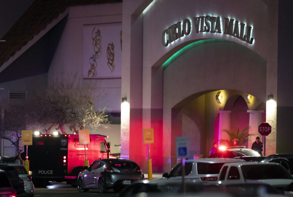 Law enforcement agents are seen at an entrance of a shopping mall, Wednesday, Feb. 15, 2023, in El Paso, Texas. Police say one person was killed and three other people were wounded in a shooting at Cielo Vista Mall. One person has been taken into custody, El Paso police spokesperson Sgt. Robert Gomez said. (AP Photo/Andrés Leighton)