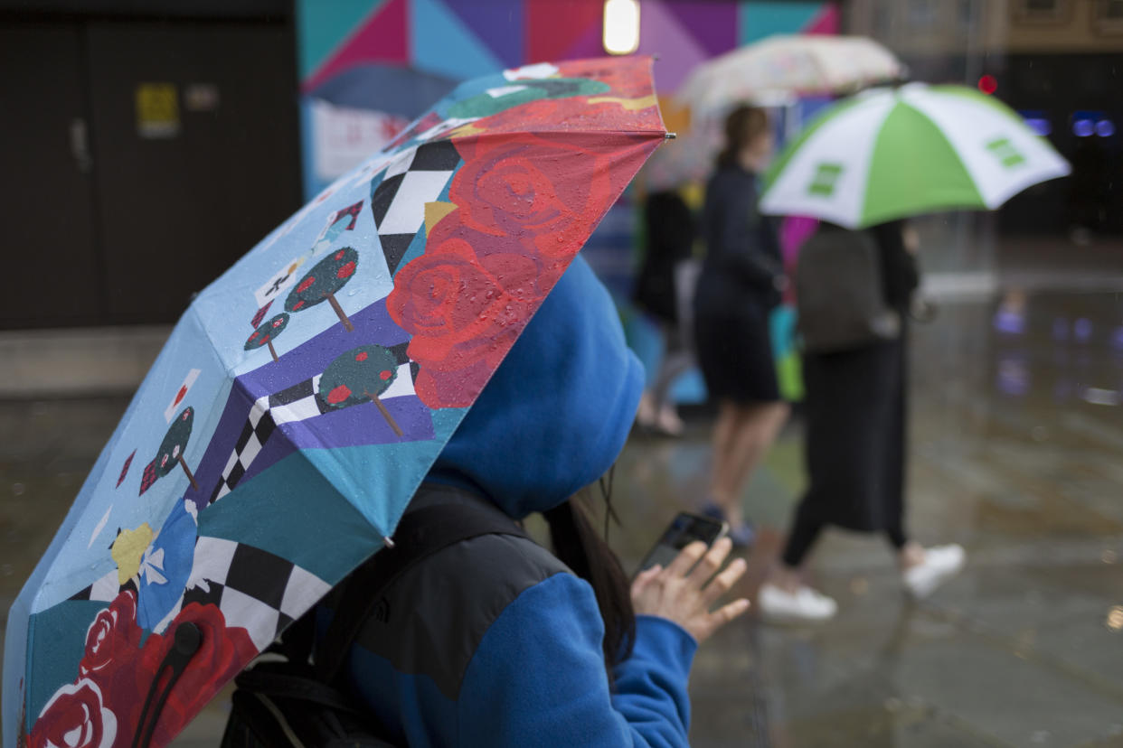 Londoners make their way through a rainy Piccadilly Circus in the West End, on 12th November 2019, in London, England. (Picture by Richard Baker / In Pictures via Getty Images)