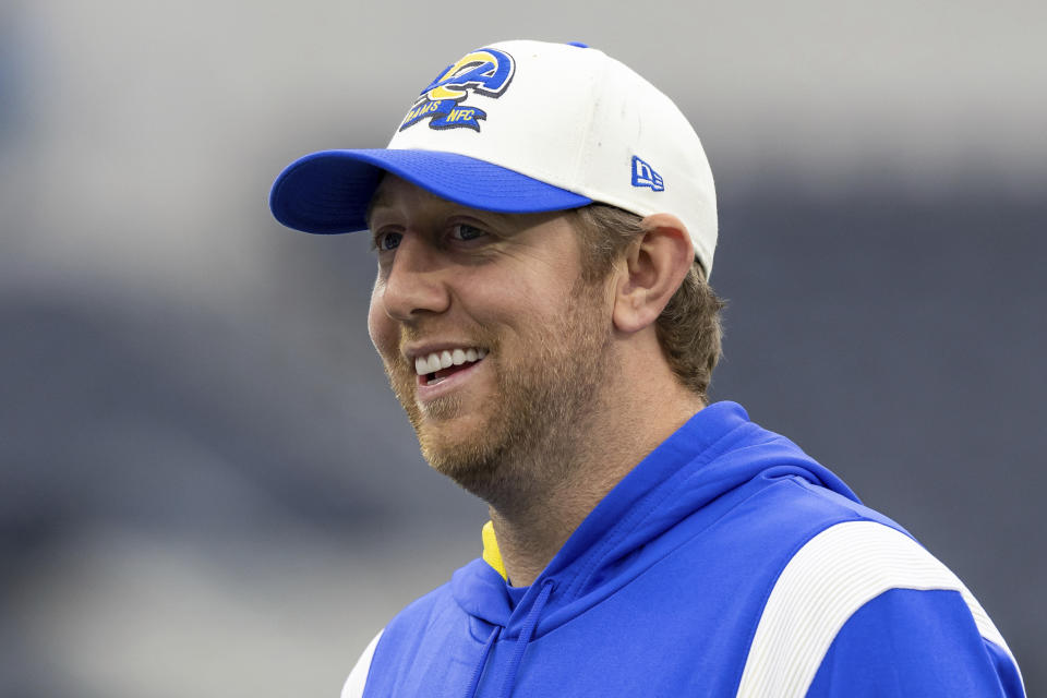 FILE - Los Angeles Rams offensive coordinator Liam Coen coaches players before the Rams play against the Seattle Seahawks in an NFL football game, Sunday, Dec. 4, 2022, in Inglewood, Calif. Kentucky coach Mark Stoops has re-hired former Los Angeles Rams assistant Liam Coen as offensive coordinator and quarterbacks coach, returning him to the program he built into one of the SEC’s top attacks in 2021. (AP Photo/Jeff Lewis, File)