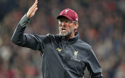 Jurgen Klopp gesticulates at his players - Credit: pa