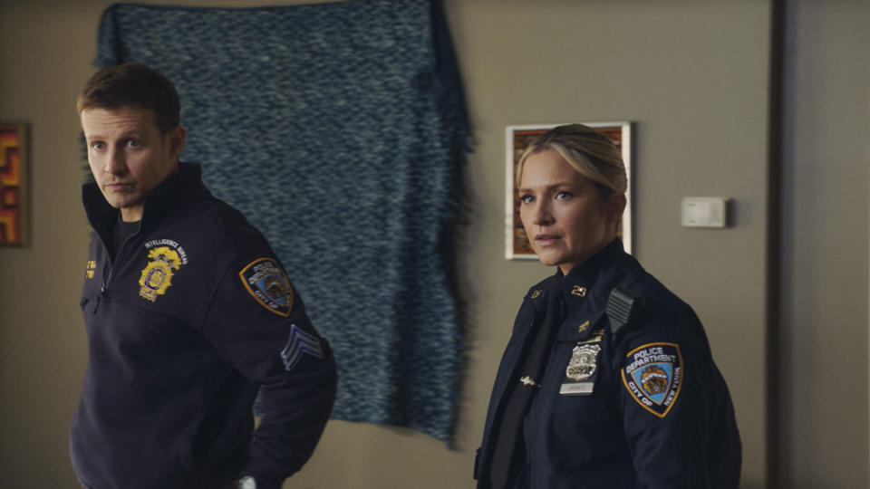 Will Estes as Jamie Reagan and Vanessa Ray as Officer Eddie Janko.