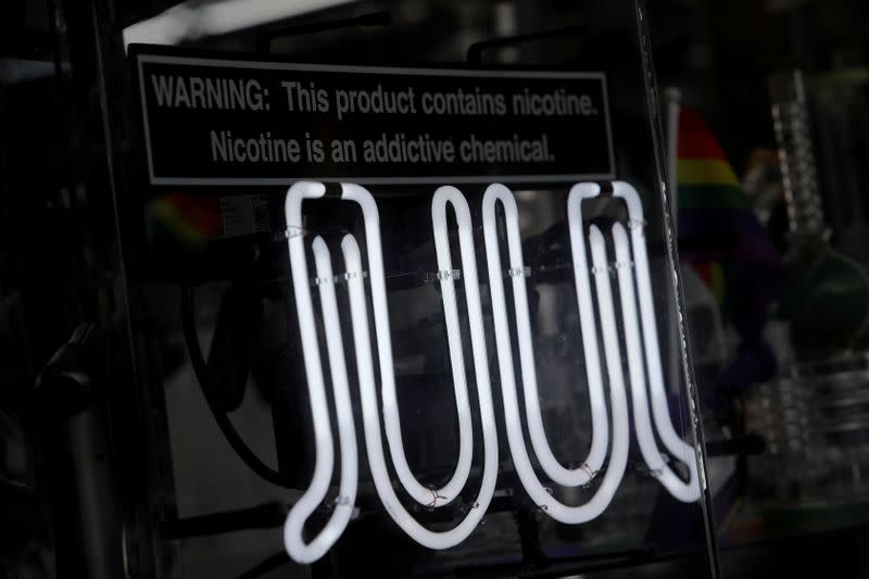 FILE PHOTO: Signage for Juul vaping products is seen on a storefront in New York City