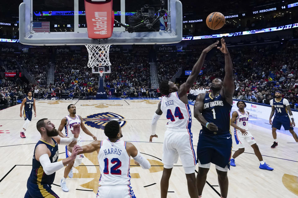 New Orleans Pelicans forward Zion Williamson (1) shoots against Philadelphia 76ers forward Paul Reed (44) in the second half of an NBA basketball game in New Orleans, Wednesday, Nov. 29, 2023. The Pelicans won 124-114. (AP Photo/Gerald Herbert)