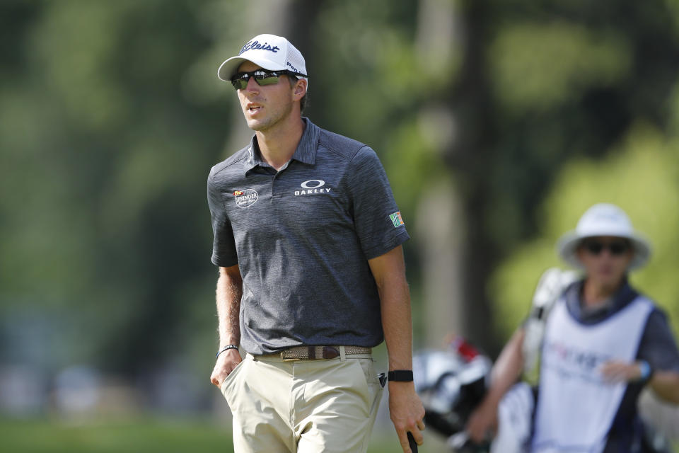 Richy Werenski walks off the ninth green during the second round of the Rocket Mortgage Classic golf tournament, Friday, July 3, 2020, at the Detroit Golf Club in Detroit. (AP Photo/Carlos Osorio)