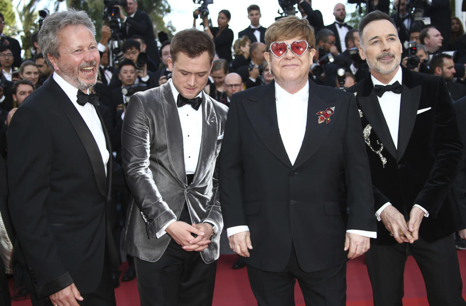 Producer Adam Bohling, actor Taron Egerton, singer Elton John and producer David Furnish pose for photographers upon arrival at the premiere of the film 'Rocketman' at the 72nd international film festival, Cannes, southern France, Thursday, May 16, 2019. (Photo by Joel C Ryan/Invision/AP)