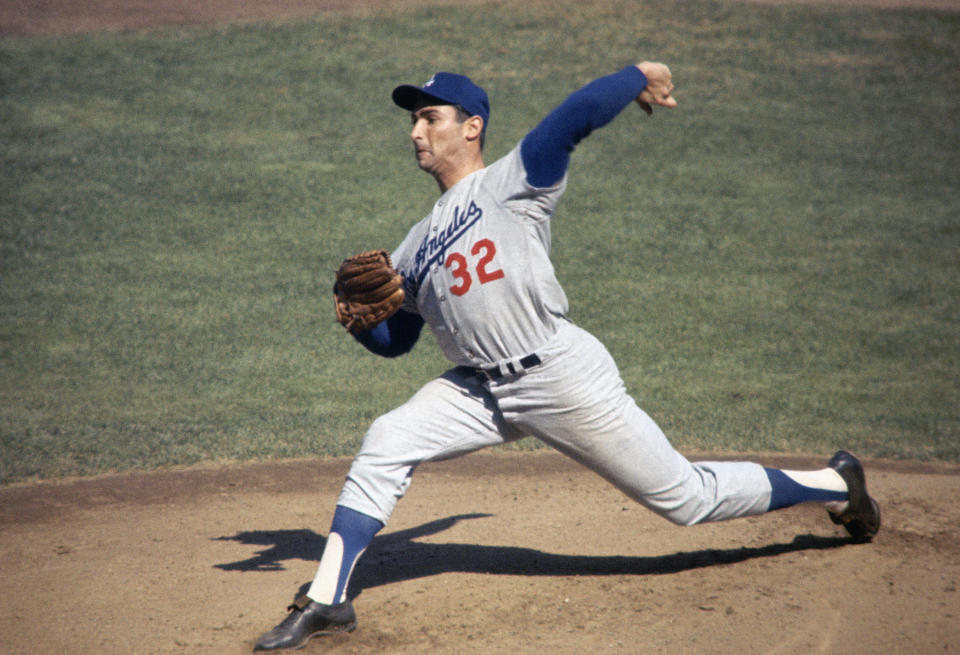 UNDATED: Pitcher Sandy Koufax #32 of the Los Angeles Dodgers uncorks a pitch during the 1960s. (Photo by Focus On Sport/Getty Images)