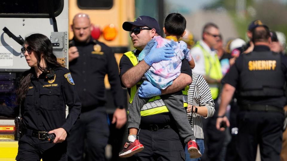 PHOTO: A boy is transported from a fatal school bus crash in Bastrop County, Texas, March 22, 2024. (Jay Janner/American-Statesman/USA TODAY Network)