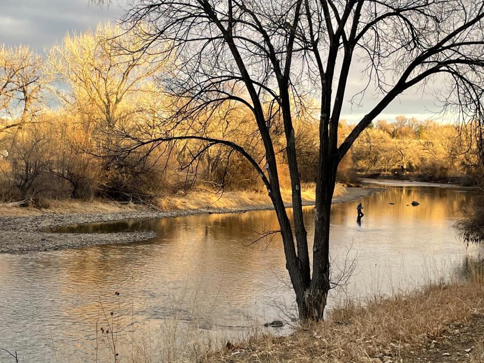 A man fishes in the Arkansas River  in Pueblo, at 5 p.m., Feb. 20, 2022