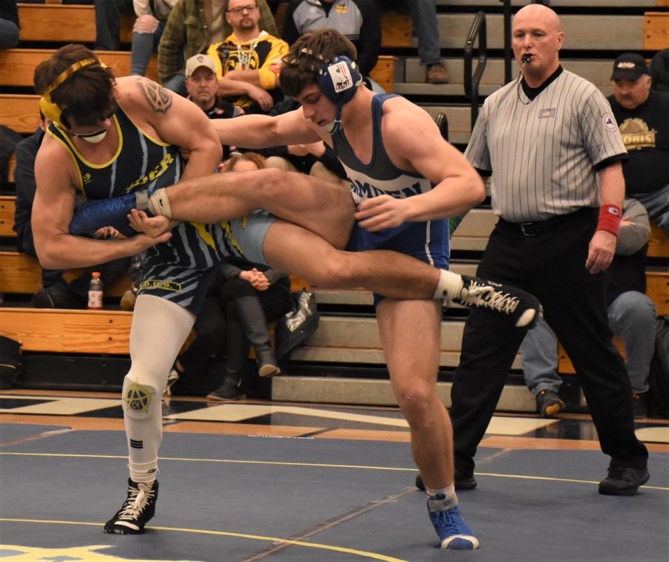 Central Valley Academy's Cole Wheet and Camden Blue Devil Lyle Walker (from left) lock up during their 172-pound bout Wednesday in Ilion.