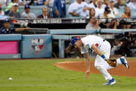 <p>Chase Utley #26 of the Los Angeles Dodgers attempts to field a ball during the third inning against the Houston Astros in game two of the 2017 World Series at Dodger Stadium on October 25, 2017 in Los Angeles, California. (Photo by Ezra Shaw/Getty Images) </p>