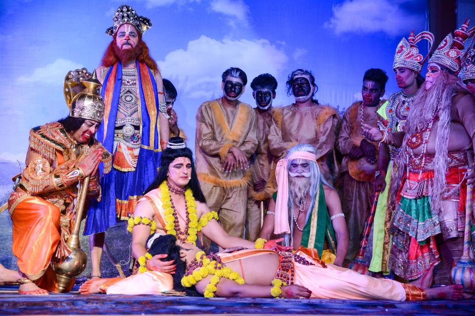 Artists perform Ramlila, a dramatic re-enactment of the life of Lord Ram, at Laxman Qila in Ayodhya, Friday, 23 October, 2020.