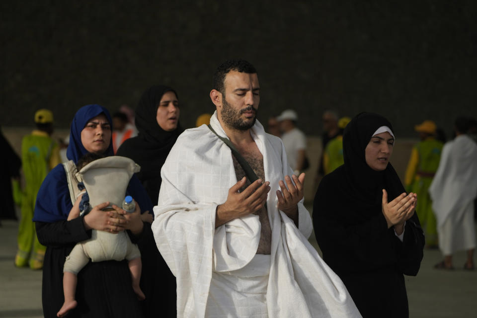 Pilgrims pray after they cast stones at a pillar in the symbolic stoning of the devil, the last rite of the annual Hajj pilgrimage, in Mina near the holly city of Mecca, Saudi Arabia, Wednesday, June 28, 2023. (AP Photo/Amr Nabil)