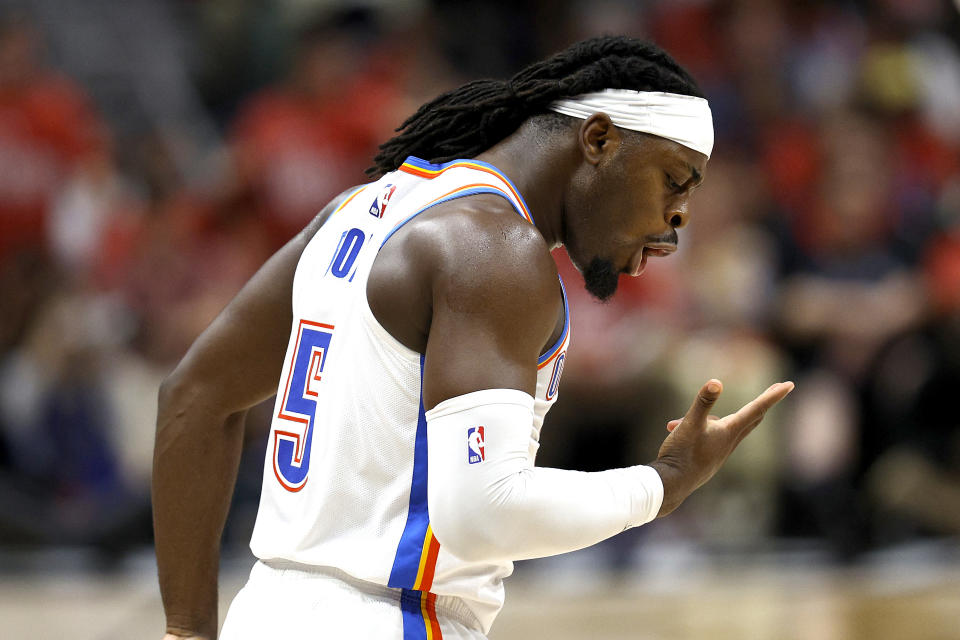 NEW ORLEANS, LOUISIANA - APRIL 27: Luguentz Dort #5 of the Oklahoma City Thunder reacts after scoring a three point basket during the second quarter in Game Three of the first round of the 2024 NBA Playoffs against the New Orleans Pelicans at Smoothie King Center on April 27, 2024 in New Orleans, Louisiana. NOTE TO USER: User expressly acknowledges and agrees that, by downloading and or using this photograph, User is consenting to the terms and conditions of the Getty Images License Agreement. (Photo by Sean Gardner/Getty Images)