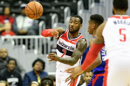 Nov 20, 2018; Washington, DC, USA; Washington Wizards guard John Wall (2) passes to forward Markieff Morris (5) as LA Clippers guard Shai Gilgeous-Alexander (2) defends during the first half at Capital One Arena. Mandatory Credit: Tommy Gilligan-USA TODAY Sports