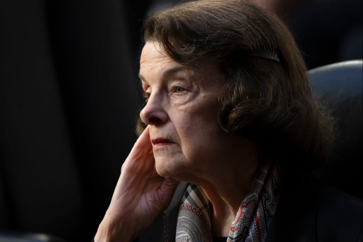 Senator Dianne Feinstein, listens as the Senate Judiciary Committee begins debate on 4 April 2022 (AP)