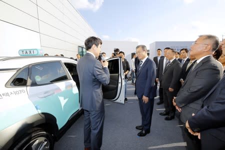 South Korean President Moon Jae-in gets a briefing at Hyundai Motor's Namyang R&D Center in Hwaseong