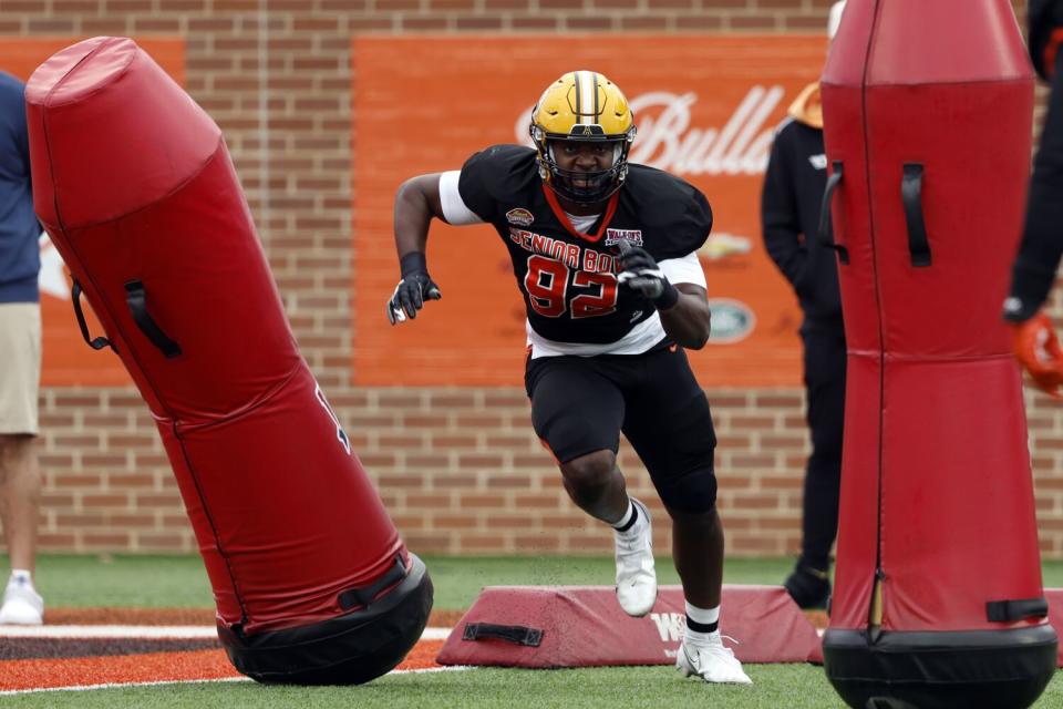 Nick Hampton runs a drill during practice.