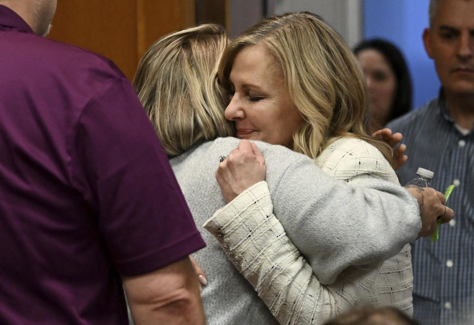 Oakland County prosecutor Karen McDonald, right, hugs Nicole Beausoleil, mother of Madisyn Baldwin, after the guilty verdict of James Crumbley, in Oakland County Court in Pontiac, Mich., Thursday, March 14, 2024. Crumbley, the father of Michigan school shooter Ethan Crumbley, was found guilty of involuntary manslaughter, a second conviction against the teen’s parents who were accused of failing to secure a gun at home and doing nothing to address acute signs of his mental turmoil. (Robin Buckson/Detroit News via AP, Pool)