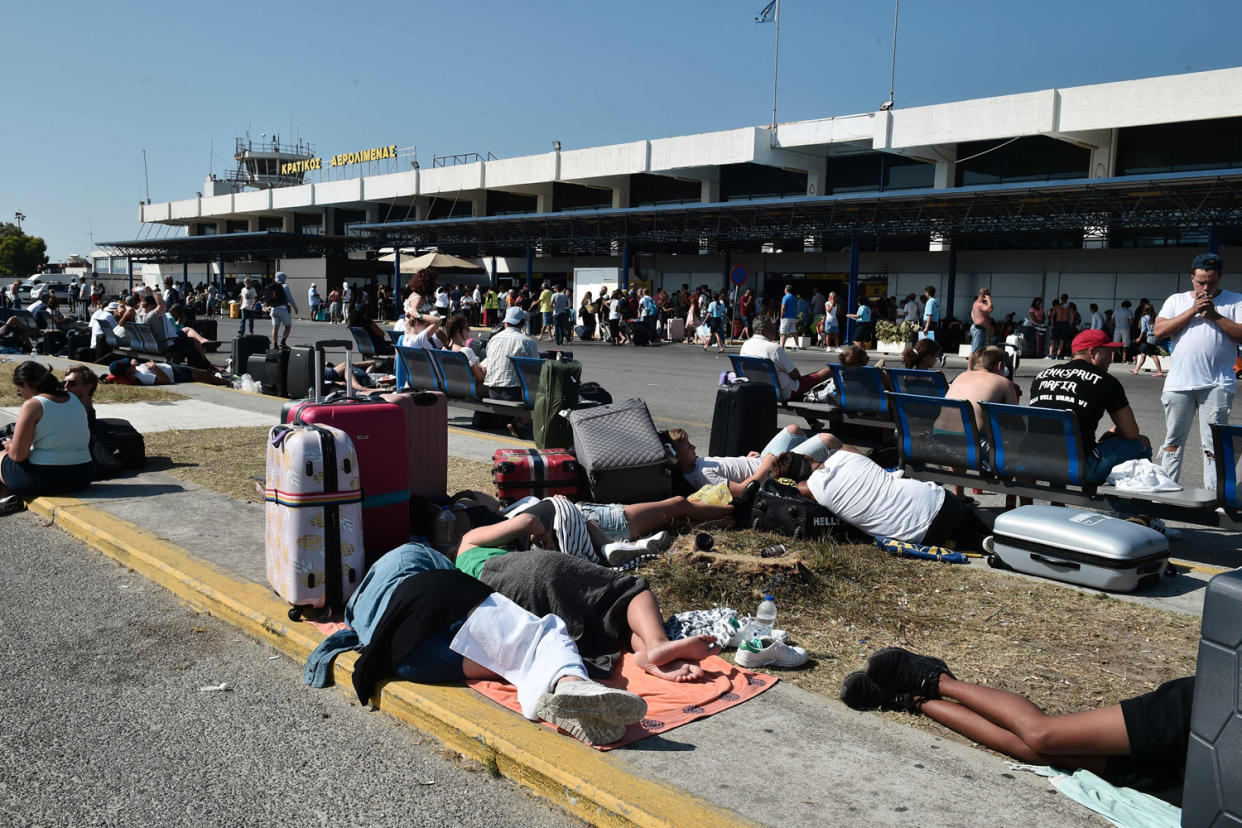 Holidaymakers sleep outside Kos airport