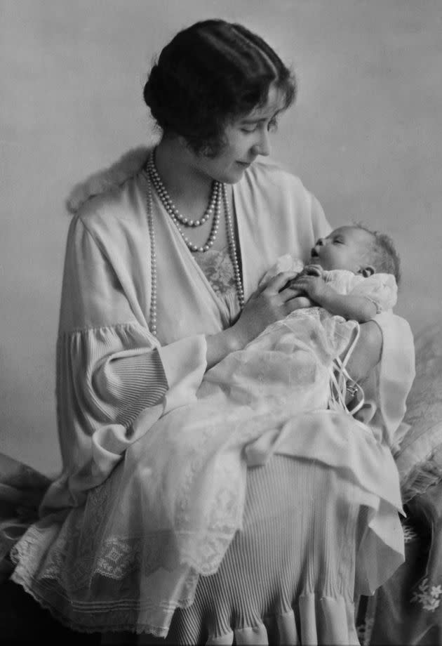 Elizabeth, Duchess of York, holds her baby daughter Princess Elizabeth, the future Queen Elizabeth II. The future queen was born in 1926. (Photo: Hulton Deutsch via Getty Images)