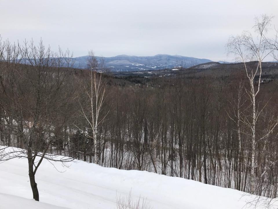 The spectacular view from Mike Krancer's house at the top of Bull Moose Ridge Road in Stowe, Vt., on Feb. 18, 2021.