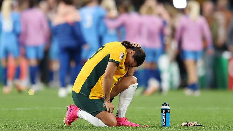 Sam Kerr looked distraught after the semifinal defeat.  - Brendon Thorne/Getty Images