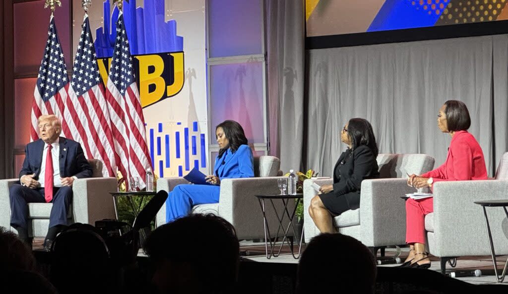 Republican presidential nominee and former President Donald Trump is questioned by journalists at the National Association of Black Journalists convention in Chicago on Wednesday, July 31, 2024. The event was moderated by, from left, Rachel Scott, senior congressional correspondent for ABC News; Kadia Goba, politics reporter at Semafor; and Harris Faulkner, anchor of The Faulkner Focus and co-host of Outnumbered on Fox News. (William J. Ford/Maryland Matters)