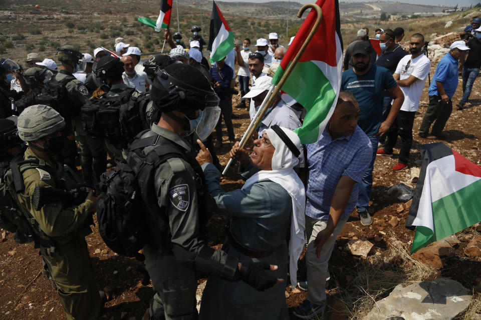 Palestinians protest against expansion of Israeli settlements in the village of Shufa in the West Bank, Tuesday, Sep. 1, 2020.(AP Photo/Majdi Mohammed)