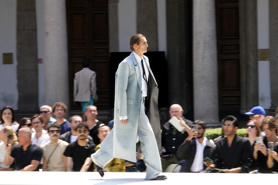 A model wears a creation as part of the Valentino men's Spring Summer 2024 collection presented in Milan, Italy, Friday, June 16, 2023. (AP Photo/Luca Bruno)