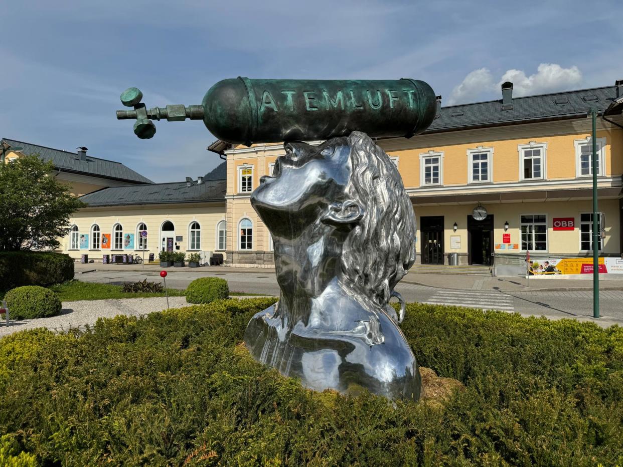 <span>Xenia Hausner’s Atemluft sculpture, outside Bad Ischl railway station, is described as “a sensory image of despair”.</span><span>Photograph: Jamie Fullerton</span>