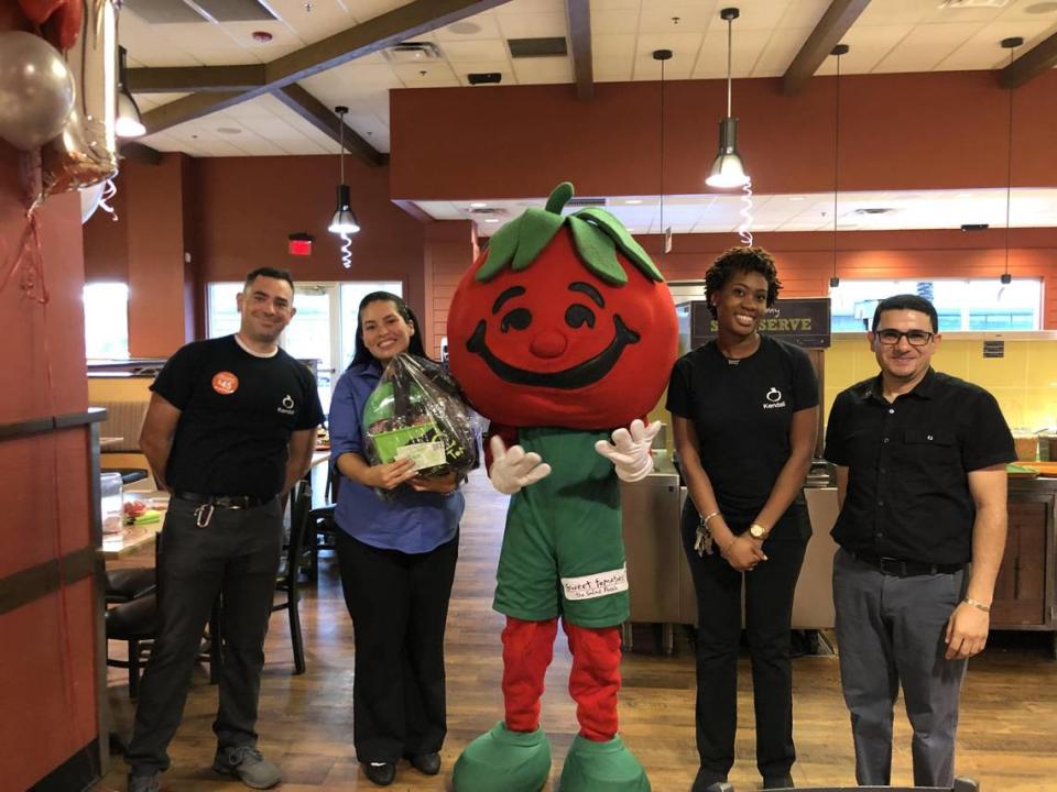 Jeff Robertson, far left, at work at Sweet Tomatoes in Kendall before he was laid off at the onset of the pandemic.