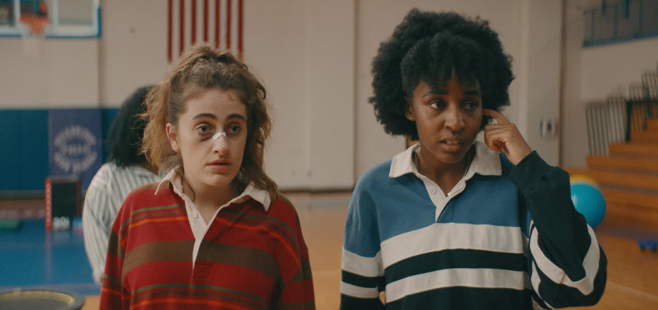 This image released by Orion Releasing shows Ayo Edebiri, right, and Rachel Sennott in a scene from "Bottoms." (Orion Releasing via AP)