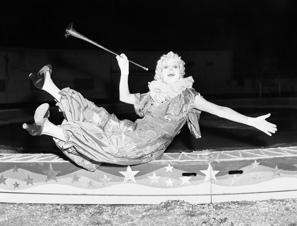 <p>Lulu Albertino, who claims to be the only woman clown in an American circus, makes her debut with the Ringling Brothers and Barnum & Bailey Circus at Madison Square Garden in New York, April 5, 1939. Lulu says “clowning is an up and down existence,” and it’s the “downs” such as this which get the biggest laughs. (AP Photo/Tom Sande) </p>