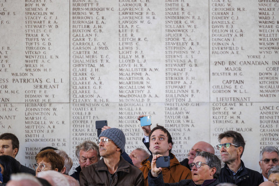 Participants attend an Armistice Day ceremony at the Menin Gate Memorial to the Missing in Ypres, Belgium, Friday, Nov. 11, 2022. Since the end of World War I in 1918, millions of visitors, from as far away as the U.S., New Zealand, and South Africa, have flocked to memorials in northern France and Belgium to pay tribute to the fallen. (AP Photo/Olivier Matthys)
