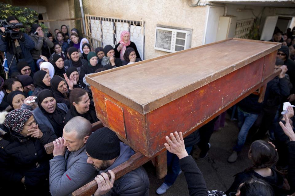 Israeli Arabs carry the coffin of Leanne Nasser, who was killed in the New Year's Eve attack in Istanbul, during her funeral, in the town of Tira, Israel, Tuesday, Jan. 3, 2017. Nasser, an 18-year-old Arab-Israeli from the town of Tira, was celebrating with friends when the gunman came in and opened fire. At least 39 people were killed and nearly 70 injured in the mass shooting that took place in front of and inside a popular Istanbul nightclub in the first hours of New Year's Day. The victims included citizens of Turkey, Saudi Arabia, Lebanon, Iraq, France, Tunisia, India, Morocco, Jordan, Kuwait, Canada, Israel, Syria, Belgium, Germany and Russia. (AP Photo/Ariel Schalit)